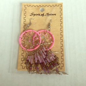 Handcrafted dangle earrings with beading